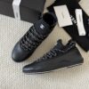 sy_no_301C920624F03E29F93F7AC768B3CE56_3 Chanel Black Leather and Knit Slip-On Low-Top Sneaker with Speckled Laces and CC Logo