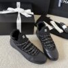 sy_no_301C920624F03E29F93F7AC768B3CE56_5 Chanel Black Leather and Knit Slip-On Low-Top Sneaker with Speckled Laces and CC Logo