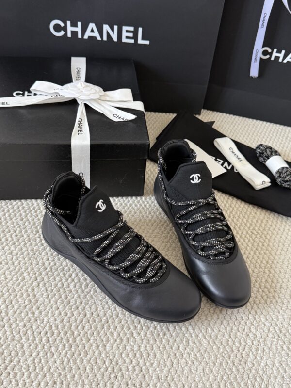 sy_no_301C920624F03E29F93F7AC768B3CE56_5 Chanel Black Leather and Knit Slip-On Low-Top Sneaker with Speckled Laces and CC Logo