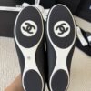 sy_no_301C920624F03E29F93F7AC768B3CE56_7 Chanel Black Leather and Knit Slip-On Low-Top Sneaker with Speckled Laces and CC Logo