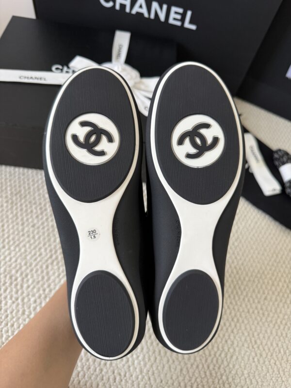 sy_no_301C920624F03E29F93F7AC768B3CE56_7 Chanel Black Leather and Knit Slip-On Low-Top Sneaker with Speckled Laces and CC Logo