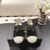 Chanel Black Suede Low-Top Shoe with Cap-Toe & CC Chain Detail