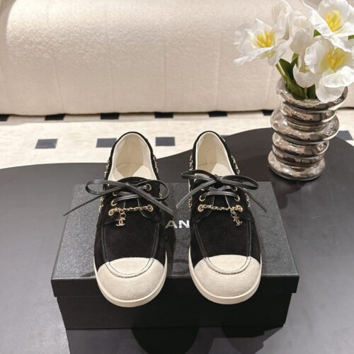 Chanel Black Suede Low-Top Shoe with Cap-Toe & CC Chain Detail