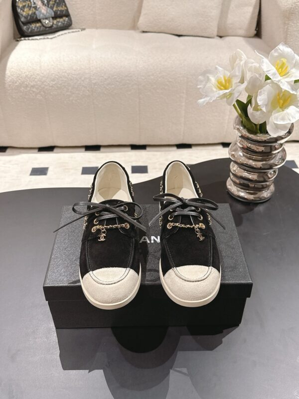 Chanel Black Suede Low-Top Shoe with Cap-Toe & CC Chain Detail