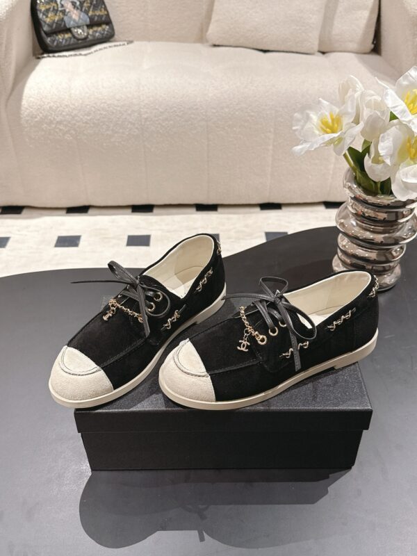 Chanel Black Suede Low-Top Shoe with Cap-Toe & CC Chain Detail