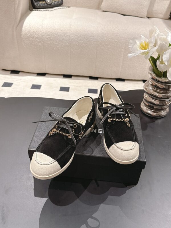 Chanel Black Suede Low-Top Shoe with Cap-Toe & CC Chain Detail