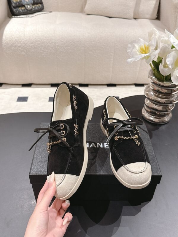 Chanel Black Suede Low-Top Shoe with Cap-Toe & CC Chain Detail