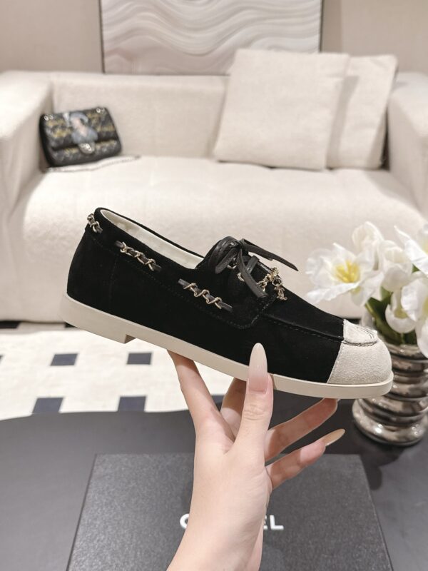 Chanel Black Suede Low-Top Shoe with Cap-Toe & CC Chain Detail