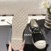Chanel Black Suede Low-Top Shoe with Cap-Toe & CC Chain Detail
