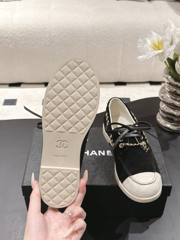Chanel Black Suede Low-Top Shoe with Cap-Toe & CC Chain Detail