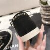Chanel Black Suede Low-Top Shoe with Cap-Toe & CC Chain Detail
