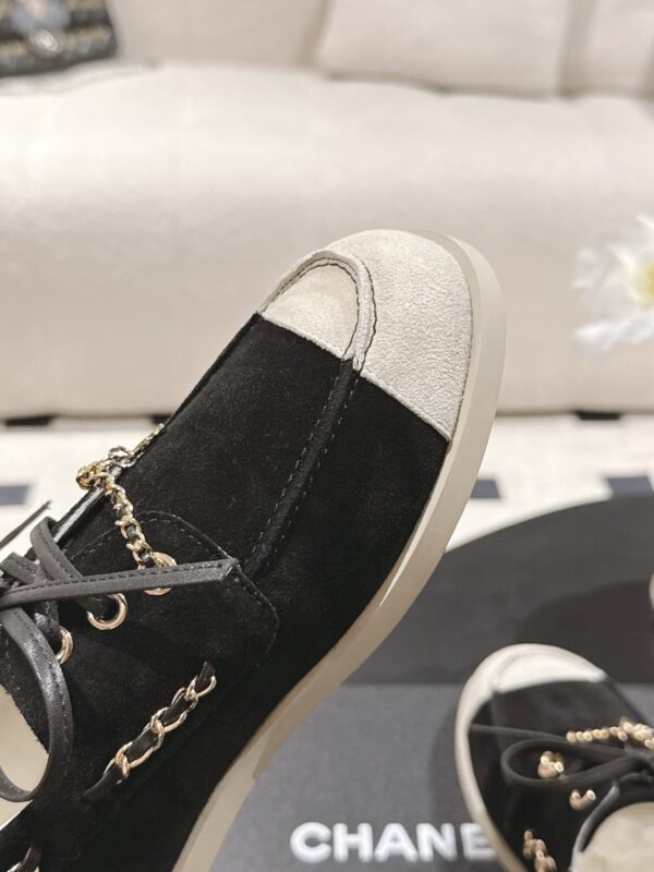 Chanel Black Suede Low-Top Shoe with Cap-Toe & CC Chain Detail