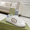 sy_no_313907CC2454D26E73E3605B98B84DA3_0 Gucci White Leather Low-Top Sneaker with Snake-Effect Interlocking G and Blue Heel Detail