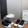 sy_no_31FCB25924299A46F3BDD2156E60204B_2 Prada Black Canvas Slip-On Platform Sneaker