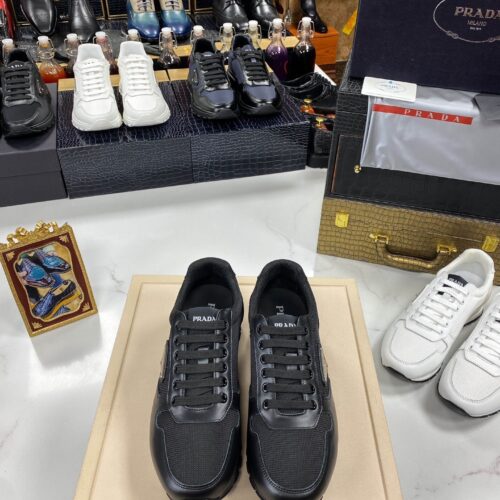 sy_no_3382BCB0367841513A8DDF1B1892AEDC_0 Prada All-Black Mesh Leather Triangle Logo Trainer