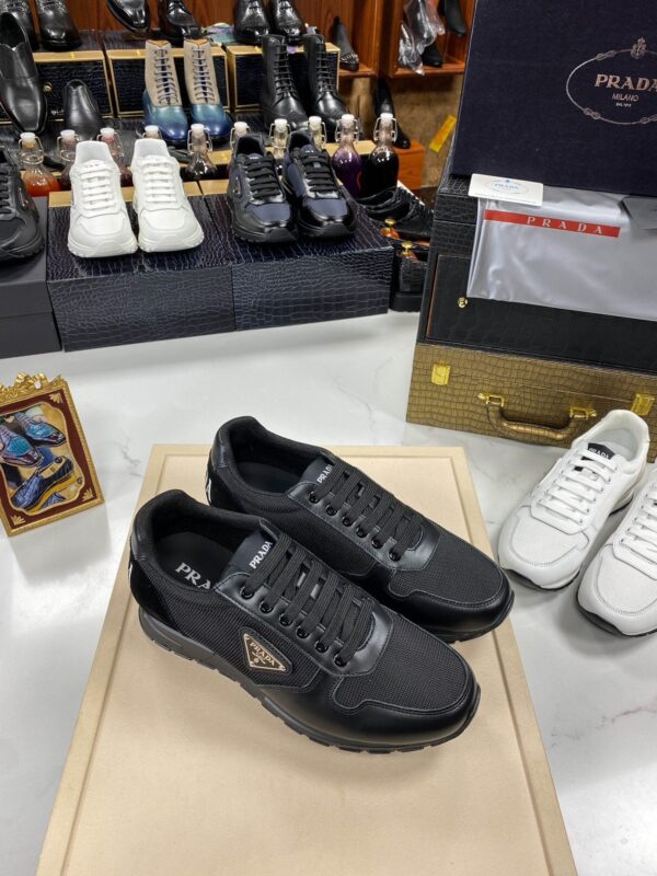 sy_no_3382BCB0367841513A8DDF1B1892AEDC_1 Prada All-Black Mesh Leather Triangle Logo Trainer