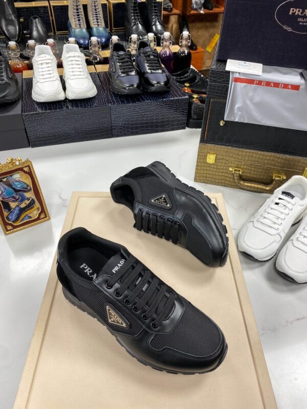 sy_no_3382BCB0367841513A8DDF1B1892AEDC_2 Prada All-Black Mesh Leather Triangle Logo Trainer