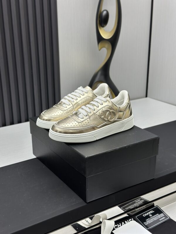 Chanel Metallic Gold Leather Low-Top Sneaker with Perforated Details & CC Logo