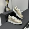 Chanel Metallic Gold Leather Low-Top Sneaker with Perforated Details & CC Logo