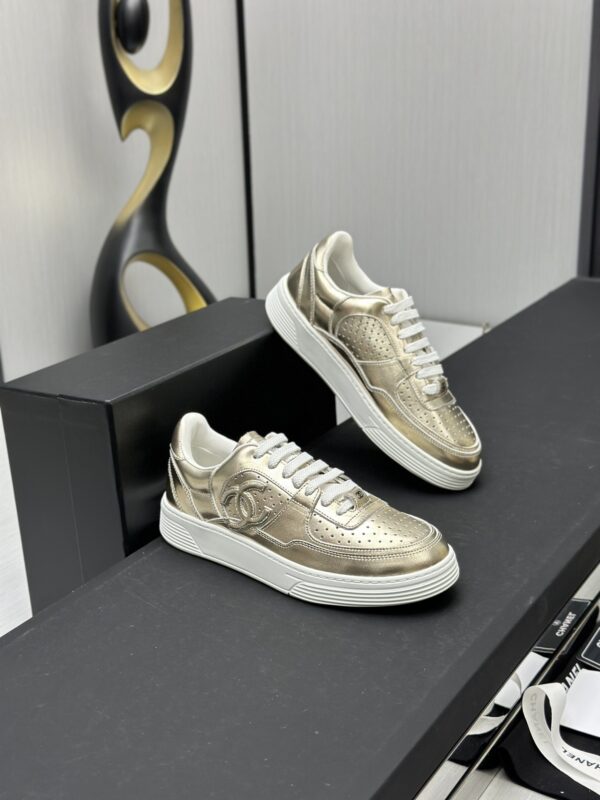 Chanel Metallic Gold Leather Low-Top Sneaker with Perforated Details & CC Logo