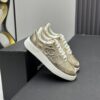 Chanel Metallic Gold Leather Low-Top Sneaker with Perforated Details & CC Logo