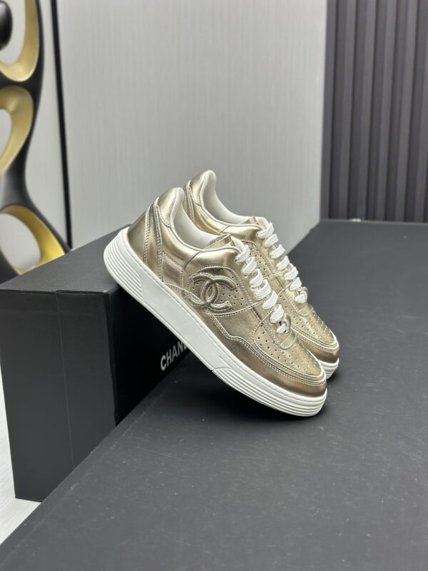 Chanel Metallic Gold Leather Low-Top Sneaker with Perforated Details & CC Logo