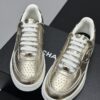 Chanel Metallic Gold Leather Low-Top Sneaker with Perforated Details & CC Logo