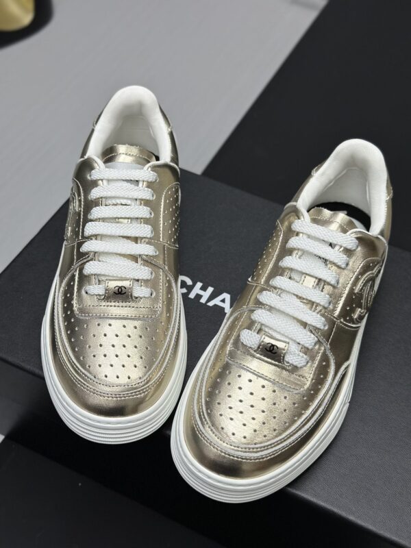 Chanel Metallic Gold Leather Low-Top Sneaker with Perforated Details & CC Logo