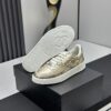 Chanel Metallic Gold Leather Low-Top Sneaker with Perforated Details & CC Logo