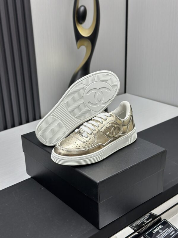 Chanel Metallic Gold Leather Low-Top Sneaker with Perforated Details & CC Logo
