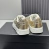 Chanel Metallic Gold Leather Low-Top Sneaker with Perforated Details & CC Logo
