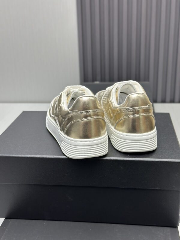 Chanel Metallic Gold Leather Low-Top Sneaker with Perforated Details & CC Logo