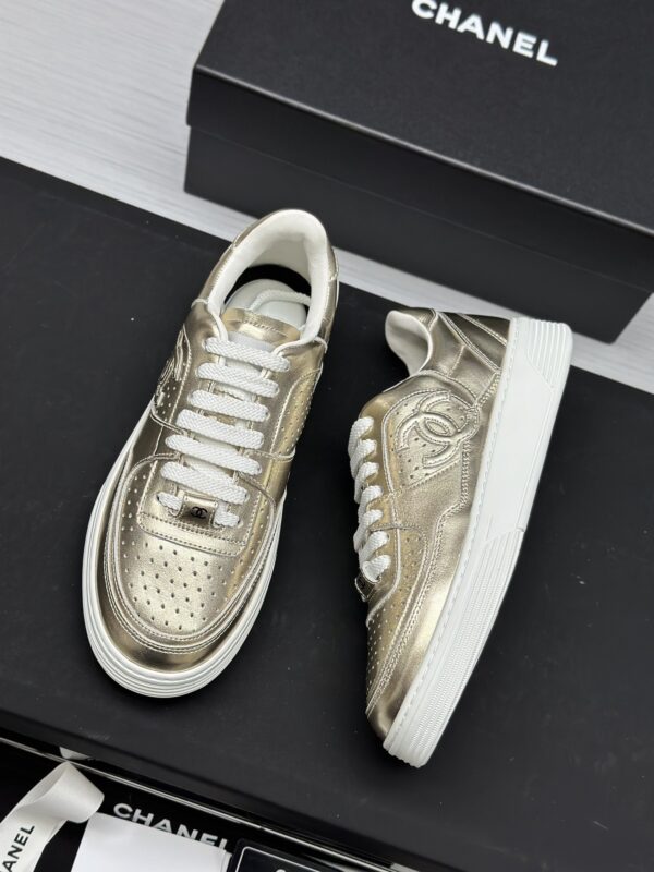 Chanel Metallic Gold Leather Low-Top Sneaker with Perforated Details & CC Logo