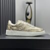 Chanel Metallic Gold Leather Low-Top Sneaker with Perforated Details & CC Logo