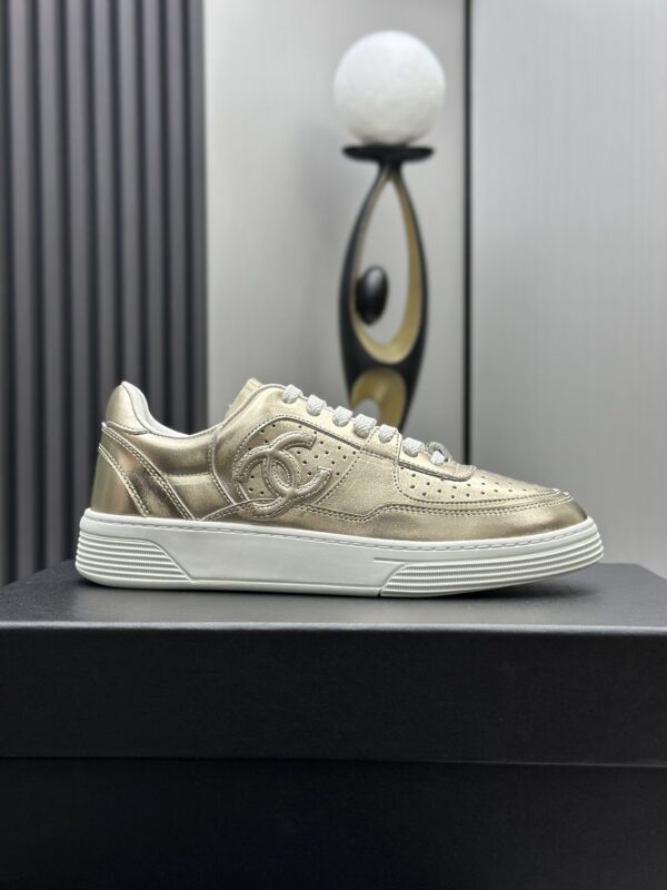 Chanel Metallic Gold Leather Low-Top Sneaker with Perforated Details & CC Logo