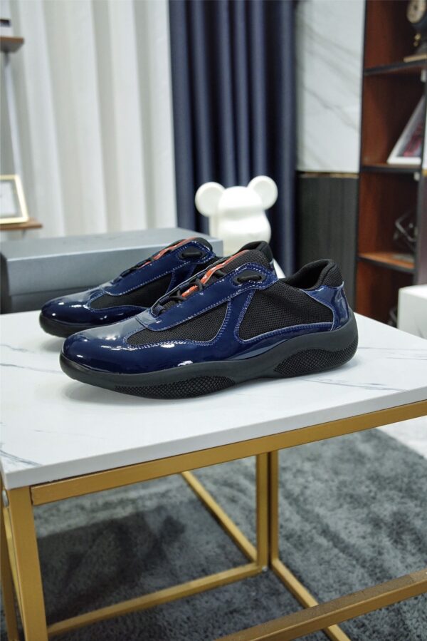 sy_no_371791160A31BC34A5E5F4AFE2E5B6A2_0 Prada America's Cup Navy Patent Mesh Sneaker