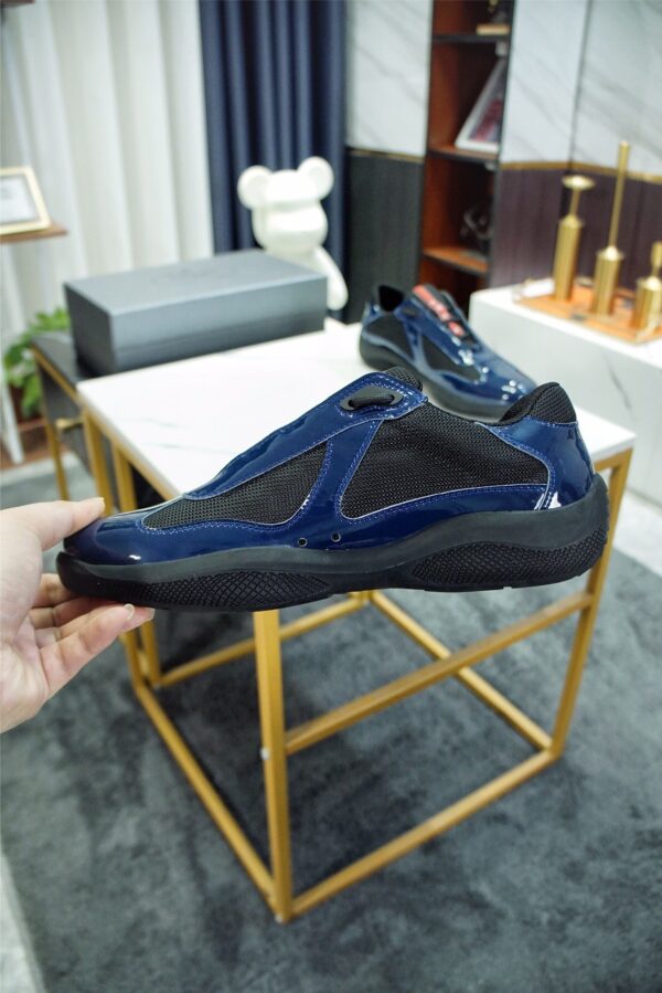 sy_no_371791160A31BC34A5E5F4AFE2E5B6A2_2 Prada America's Cup Navy Patent Mesh Sneaker
