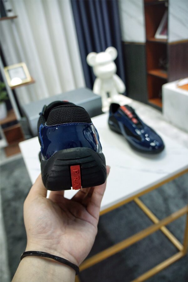 sy_no_371791160A31BC34A5E5F4AFE2E5B6A2_7 Prada America's Cup Navy Patent Mesh Sneaker
