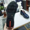 sy_no_371791160A31BC34A5E5F4AFE2E5B6A2_8 Prada America's Cup Navy Patent Mesh Sneaker