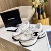sy_no_3850401E4B8C7838C2652833F24D170A_1 Chanel Beige and White Chunky Sneaker with Black CC Logo and Metallic Trim