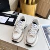 sy_no_3850401E4B8C7838C2652833F24D170A_2 Chanel Beige and White Chunky Sneaker with Black CC Logo and Metallic Trim