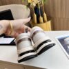 sy_no_3850401E4B8C7838C2652833F24D170A_4 Chanel Beige and White Chunky Sneaker with Black CC Logo and Metallic Trim