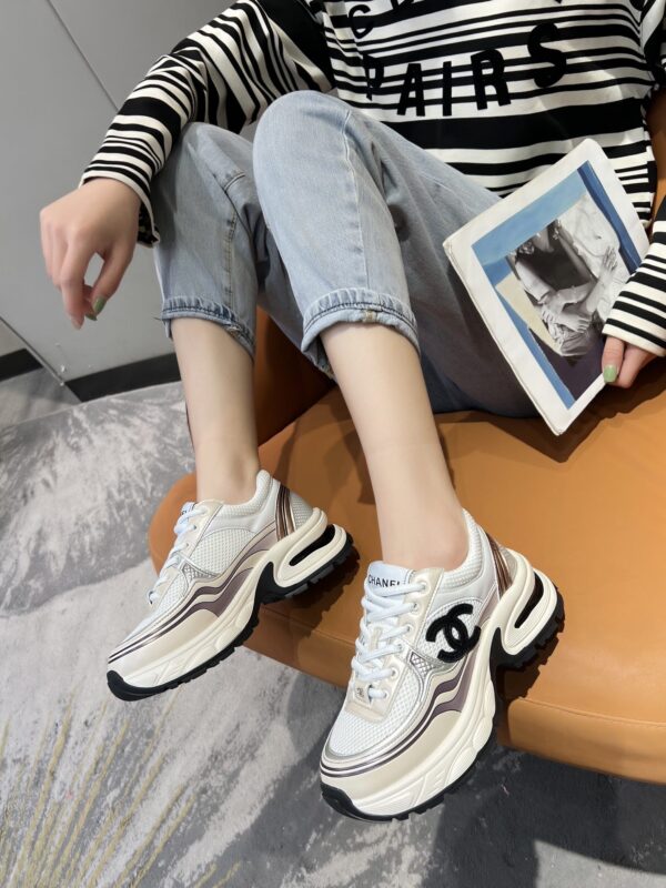 sy_no_3850401E4B8C7838C2652833F24D170A_5 Chanel Beige and White Chunky Sneaker with Black CC Logo and Metallic Trim