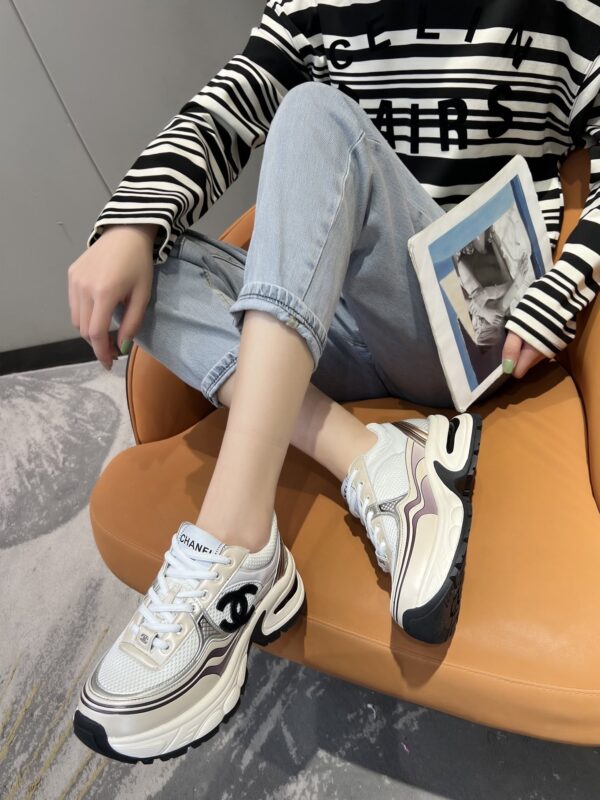sy_no_3850401E4B8C7838C2652833F24D170A_6 Chanel Beige and White Chunky Sneaker with Black CC Logo and Metallic Trim