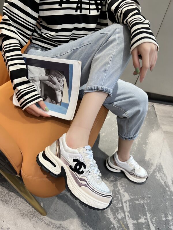 sy_no_3850401E4B8C7838C2652833F24D170A_7 Chanel Beige and White Chunky Sneaker with Black CC Logo and Metallic Trim