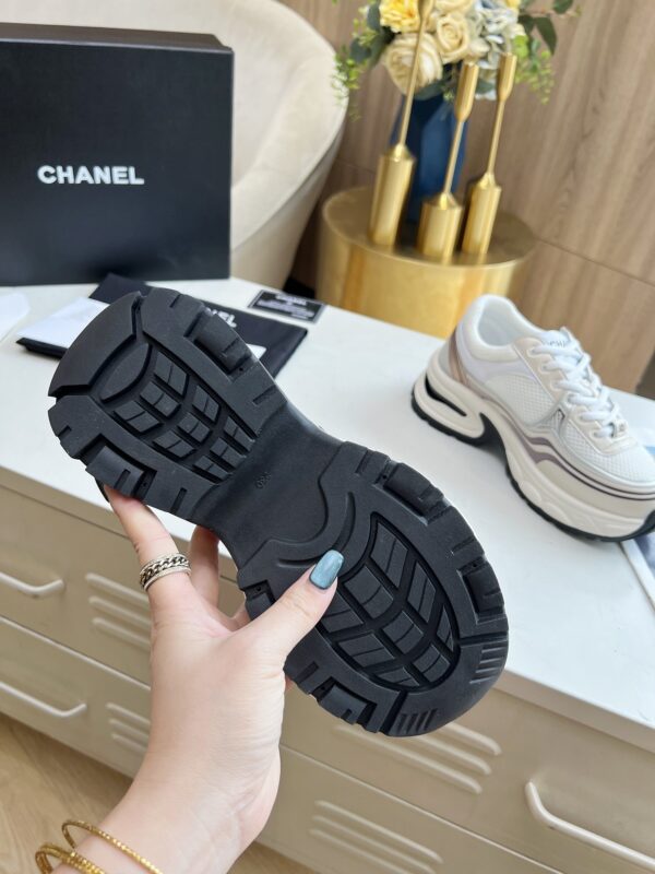 sy_no_3850401E4B8C7838C2652833F24D170A_8 Chanel Beige and White Chunky Sneaker with Black CC Logo and Metallic Trim