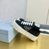 sy_no_3904696329EAD97E26B49D667404B746_0 Prada Black Canvas Triangle Tread Platform Sneaker