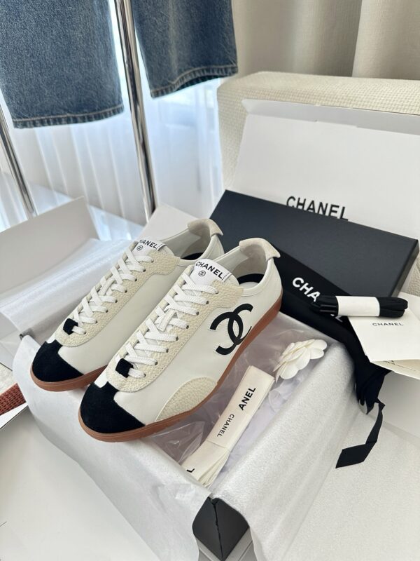Chanel White and Black Cap-Toe Low-Top Sneaker with Suede Detailing