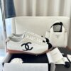 Chanel White and Black Cap-Toe Low-Top Sneaker with Suede Detailing