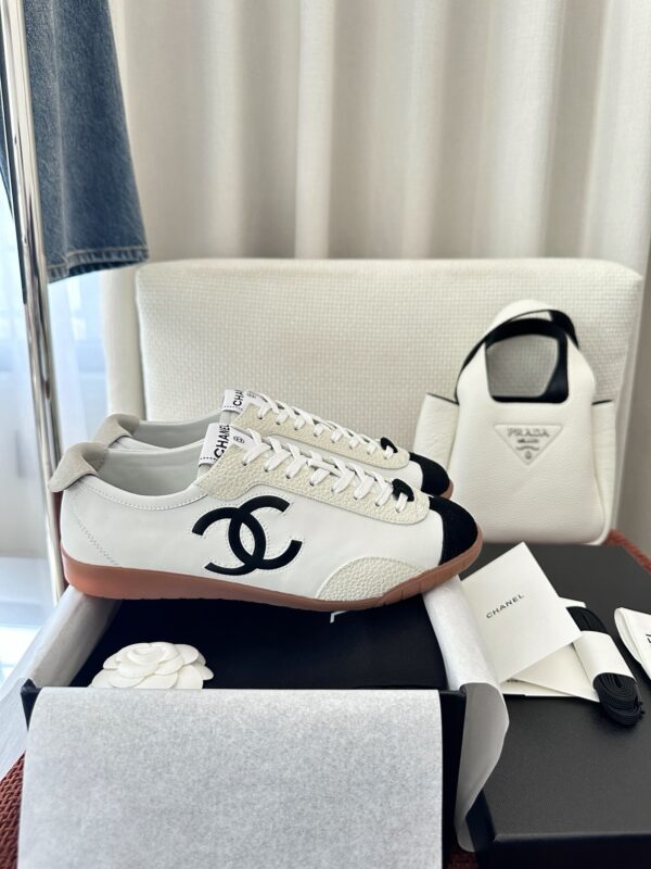 Chanel White and Black Cap-Toe Low-Top Sneaker with Suede Detailing